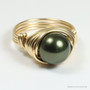 10mm dark olive green pearl solitaire ring in 14K yellow gold filled wire wrapped setting and band handmade by Jessica Luu Jewelry