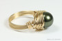 10mm dark olive green pearl solitaire ring in 14K yellow gold filled wire wrapped setting and band handmade by Jessica Luu Jewelry
