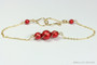 6mm and 8mm red pearls in 14K yellow gold filled wire wrapped setting on chain bracelet handmade by Jessica Luu Jewelry