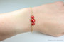 6mm and 8mm red pearls in 14K yellow gold filled wire wrapped setting on chain bracelet handmade by Jessica Luu Jewelry