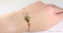 14K gold filled wire wrapped bangle bracelet with 10mm olive green pearl solitaire handmade by Jessica Luu Jewelry