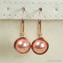 8mm peach pearl drop earrings in 14K rose gold filled wire wrapped setting handmade by Jessica Luu Jewelry