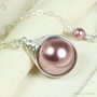 12mm blush pink pearl solitaire in sterling silver wire wrapped setting on 18 inch long chain necklace handmade by Jessica Luu Jewelry