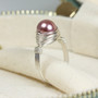 8mm blush pink pearl solitaire ring in sterling silver wire wrapped setting and band handmade by Jessica Luu Jewelry