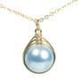 12mm light blue pearl solitaire in 14K yellow gold filled wire wrapped setting on 18 inch long chain necklace handmade by Jessica Luu Jewelry