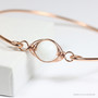 14K rose gold filled bangle bracelet with 10mm white alabaster faceted gemstone solitaire handmade by Jessica Luu Jewelry