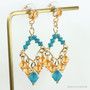 14K yellow gold filled chandelier earrings with blue and orange faceted Austrian crystals handmade by Jessica Luu Jewelry