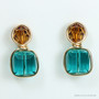 Two tone earrings with 8mm teal blue faceted cube shaped Austrian crystals and 6mm amber  brown faceted round Austrian crystals in 14K yellow gold filled wire wrapped setting handmade by Jessica Luu Jewelry
