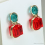 Cherry red and teal blue Austrian crystal two tone earrings in 14K yellow gold filled wire wrapped setting handmade by Jessica Luu Jewelry