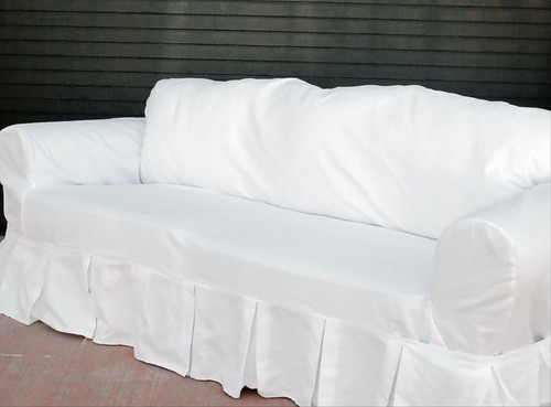 This is an actual photo of a slipcovered ugly sofa. No catalog photo magic...this is the real deal!