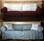 Everyday tie slipcover in slate twill covering one of the ugliest sofas known to man.