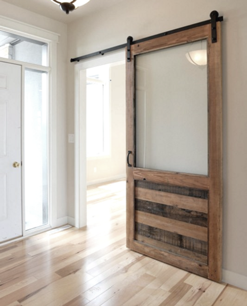 reclaimed sliding barn door with large window lifestyle