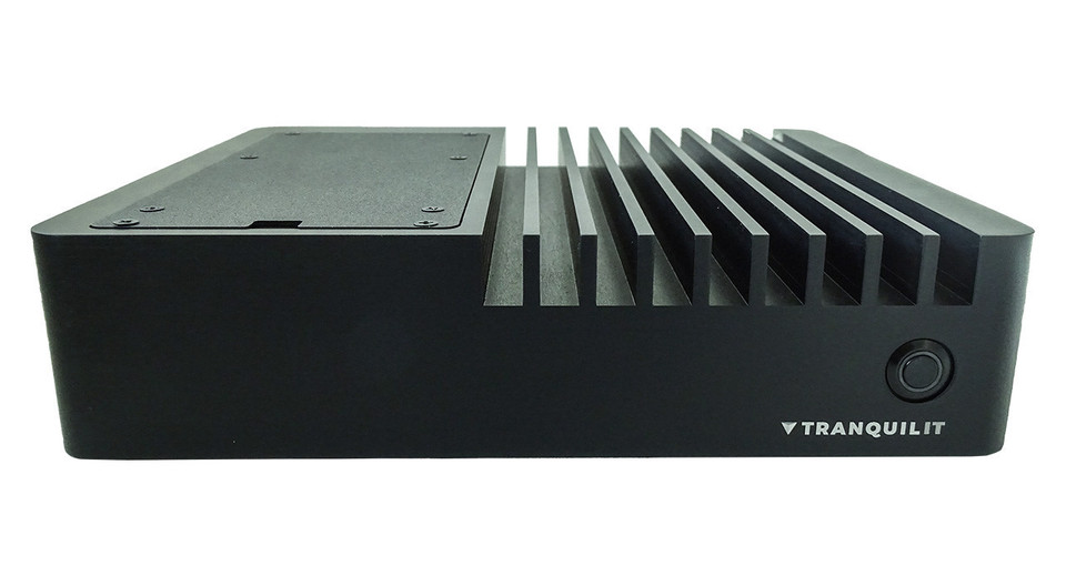 Tranquil IT latest Intel 14th Gen Mobile Fanless Mini, a robust mini PC with a streamlined design for heat dissipation. It includes a front power button for easy access. Tranquil IT latest Intel 14th Gen Mobile Fanless Mini, a robust mini PC with a streamlined design for heat dissipation. It includes a front power button for easy access.