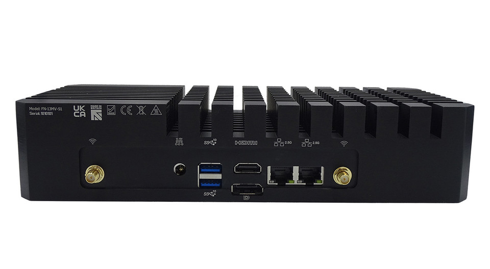 Rear view of Rugged NUC featuring various ports including HDMI, USB, RJ45 Ethernet, and others, along with physical connection points for antennas. Rear view of Rugged NUC featuring various ports including HDMI, USB, RJ45 Ethernet, and others, along with physical connection points for antennas.