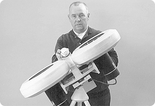 Founder John Paulson with the first JUGS Curveball Pitching Machine in 1971.