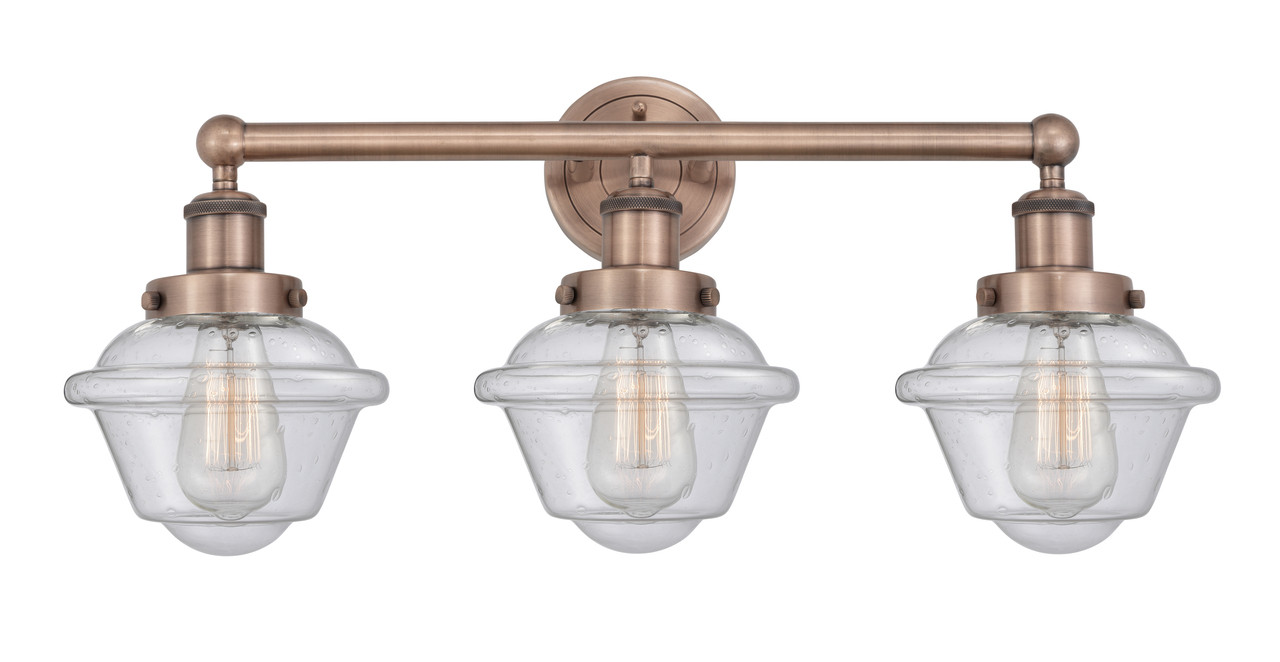 INNOVATIONS 616-3W-AC-G534 Oxford 3 24.5 inch Bath Vanity Light Antique Copper