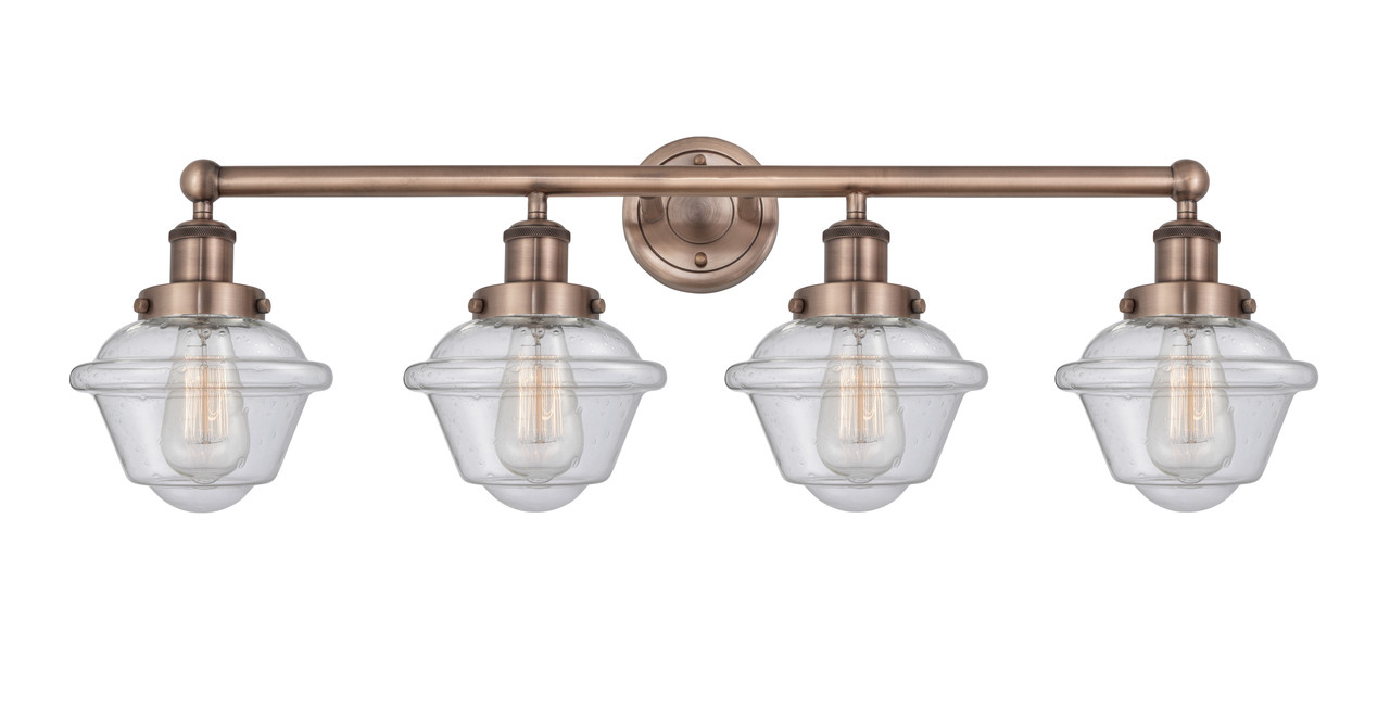 INNOVATIONS 616-4W-AC-G534 Oxford 4 33.5 inch Bath Vanity Light Antique Copper