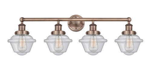 INNOVATIONS 616-4W-AC-G534 Oxford 4 33.5 inch Bath Vanity Light Antique Copper
