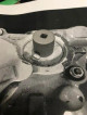 The socket shown is laying on top of a photograph of a gearbox. The socket when on the gearbox fills the entire depression where the adjusting valve is. This is an optical illusion of the size of the socket when compared to the gearbox.