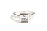 14kt white gold princess cut diamond solitaire engagement ring.  Contact us for exact pricing and diamond information. This ring can be made in any combination of stone size and metal type.  Starting at $1500.