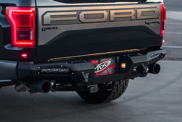 Addictive Desert Designs Raptor Honey Badger Rear Bumper (10" lights) w/ Backup Sensor Cutouts (2017-2019) - Image