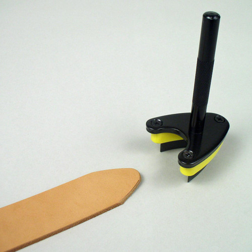 This pointed strap end punch tool quickly cuts the shape end of a leather belt, strap or strip to save you time.