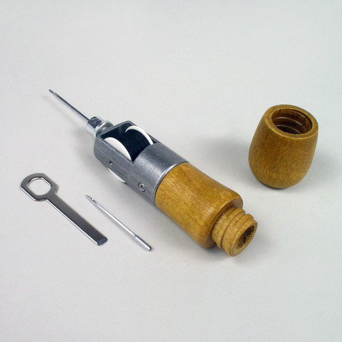 The hollow awl handle stores your extra needle and wrench.