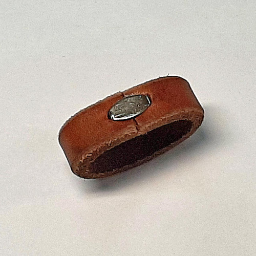 Leather staple for belt keeper in silver color.