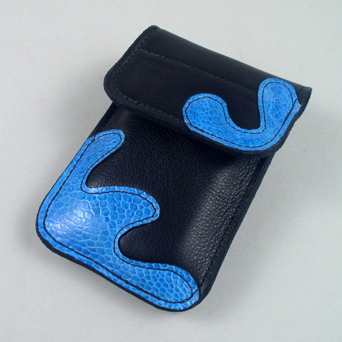 Soft Leather belt phone holster accented with decorative leather corners.