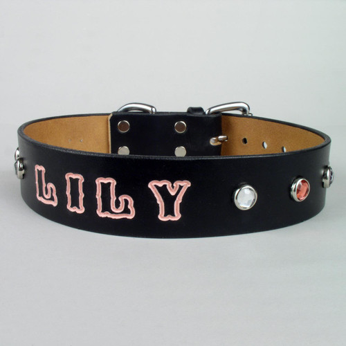 This personalized jeweled dog collar with the imprinted letters hand painted in pink is 1 1/2 inches wide.  The 1 inch wide personalized jeweled dog collar will have the same size 3/4 inch letters and same size studs.