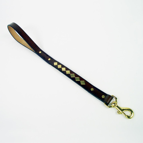 This two foot leather leash for dogs is decorated with solid brass diamond studs.