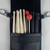 This leather drumstick bag can hold a nice variety of sticks and brushes.