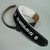 Sheepskin padding on leather personalized guitar strap.