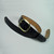 Plain style belt guitar strap made of black full grain cowhide with a gold solid brass buckle for adjustment.