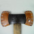 This double bit axe sheath requires two covers.  No matter which way the axe is picked up, you always have one side facing you that you can unsnap.