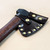 Heavy duty leather axe cover with solid brass rivets and snaps to prevent rusting.