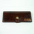 Brown personalized women's leather wallet with embossed lettering in undyed color.