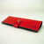 Red personalized women's leather wallet with embossed lettering dyed in. 