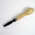 This V gouge leathercraft tool has a nice contoured wood handle. 