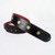 Handmade shotgun guitar strap with red stitching and soft red leather lining.