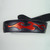 Leather guitar strap inlaid with red metallic leather.