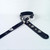The buckle allows for adjusting length on this decorated handmade guitar strap lined with soft garment leather.