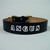 Custom leather dog collar with deep imprinted white lettering.