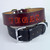 Personalized leather dog collar with imprinted name hand painted in red.