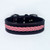 Pink leather braiding decorates this handmade dog collar. Pink leather braiding decorates this handmade dog collar.