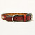 Red leather studded dog collar with diamond studs.