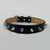 Black leather spiked dog collar with silver spikes that are 1/2 inch high.