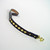 This two foot leather leash for dogs is decorated with solid brass studs diamond shaped.