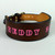 Name personalized in pink on this double thick leather dog collar.