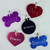 Personalized dog tags with your dog's name and phone number engraved.